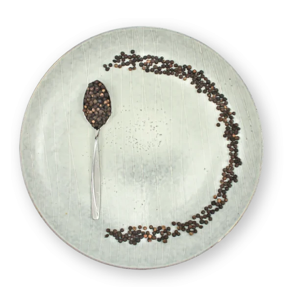 Black Peppercorns Whole in plate